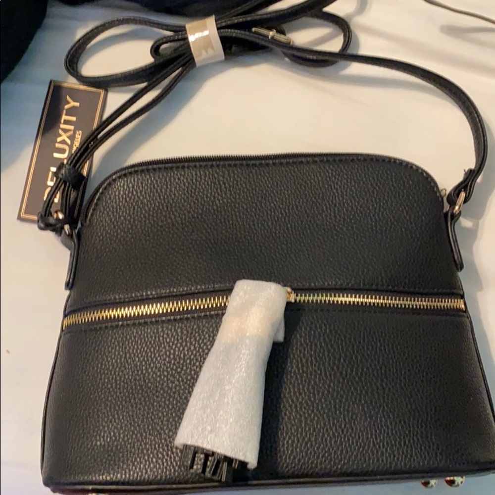 Black pocket book. NWT